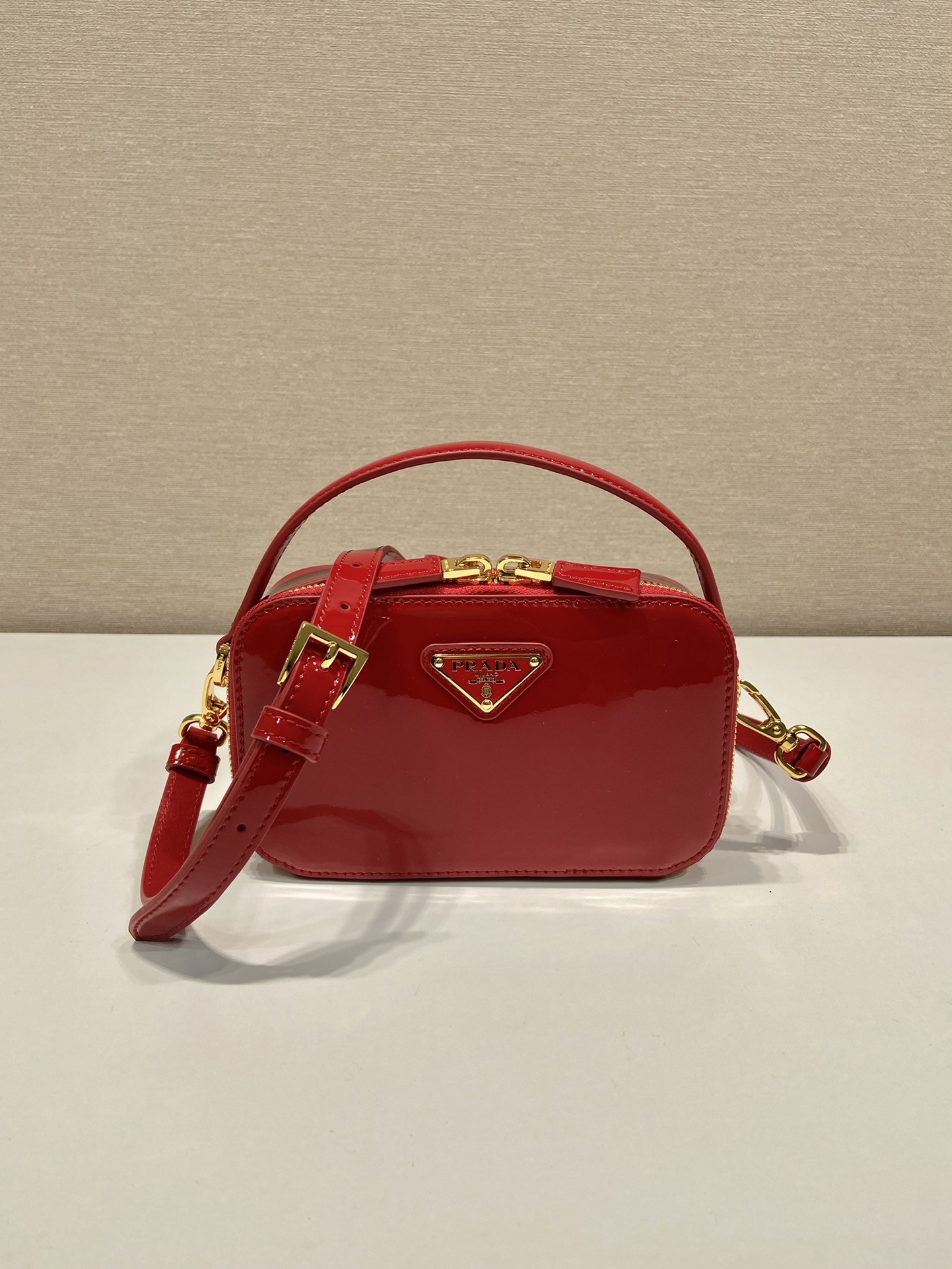 Pra*a odette patent leather mini-bag