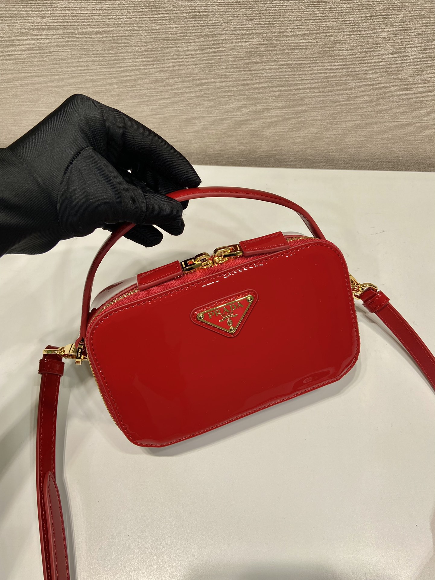 Pra*a odette patent leather mini-bag