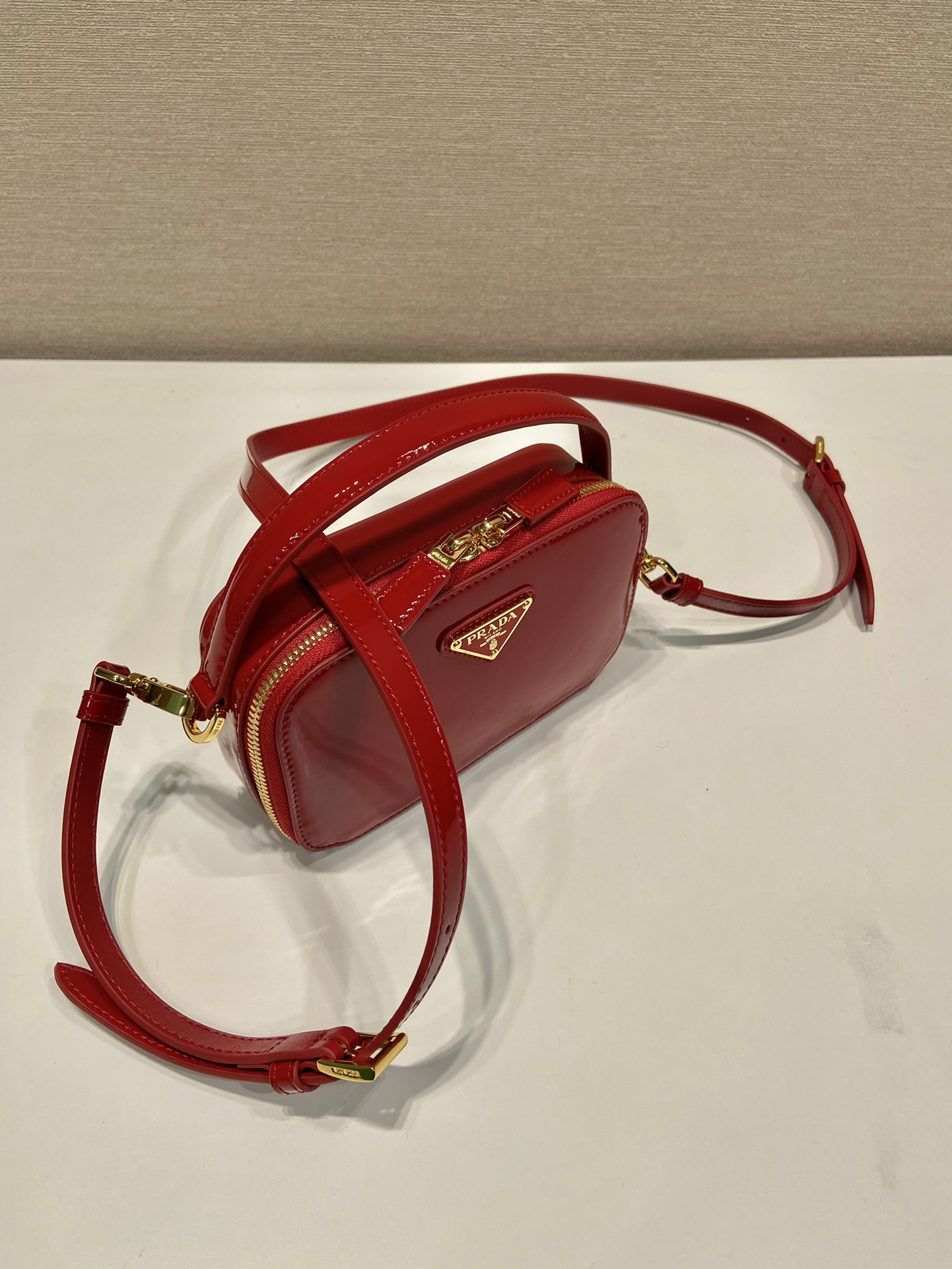 Pra*a odette patent leather mini-bag