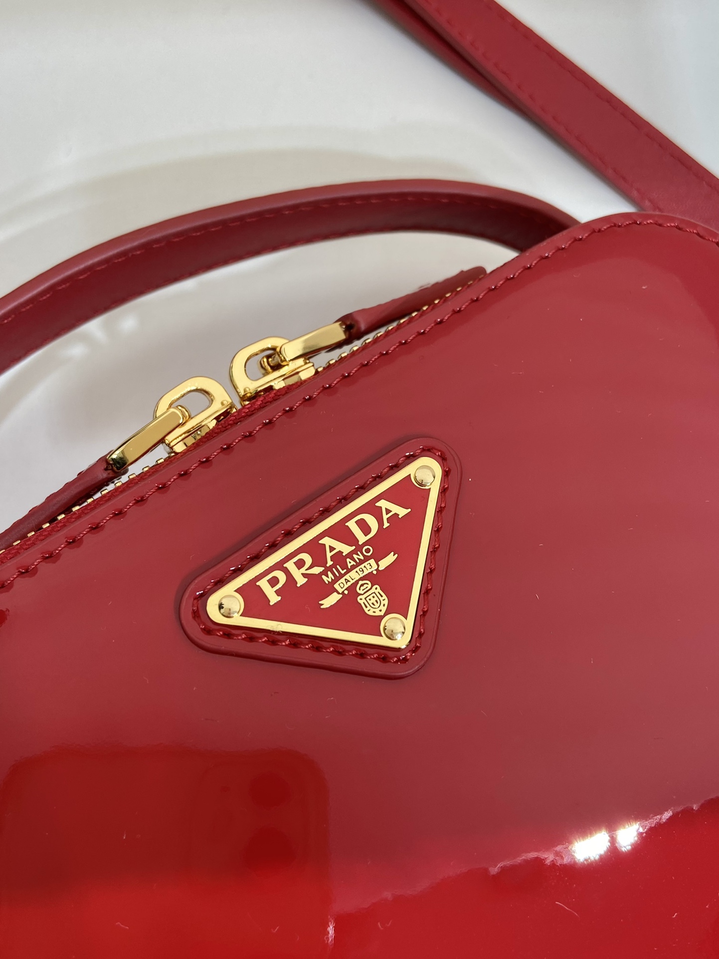 Pra*a odette patent leather mini-bag