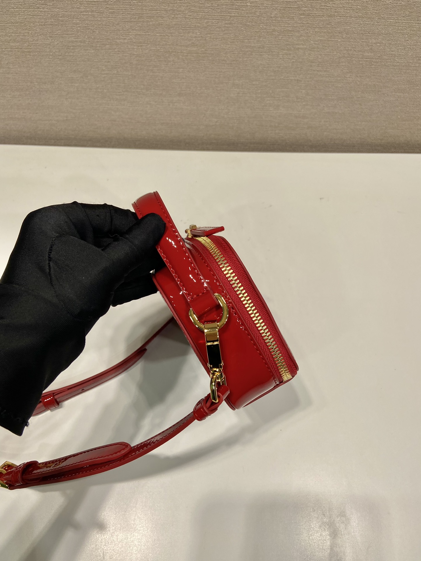 Pra*a odette patent leather mini-bag