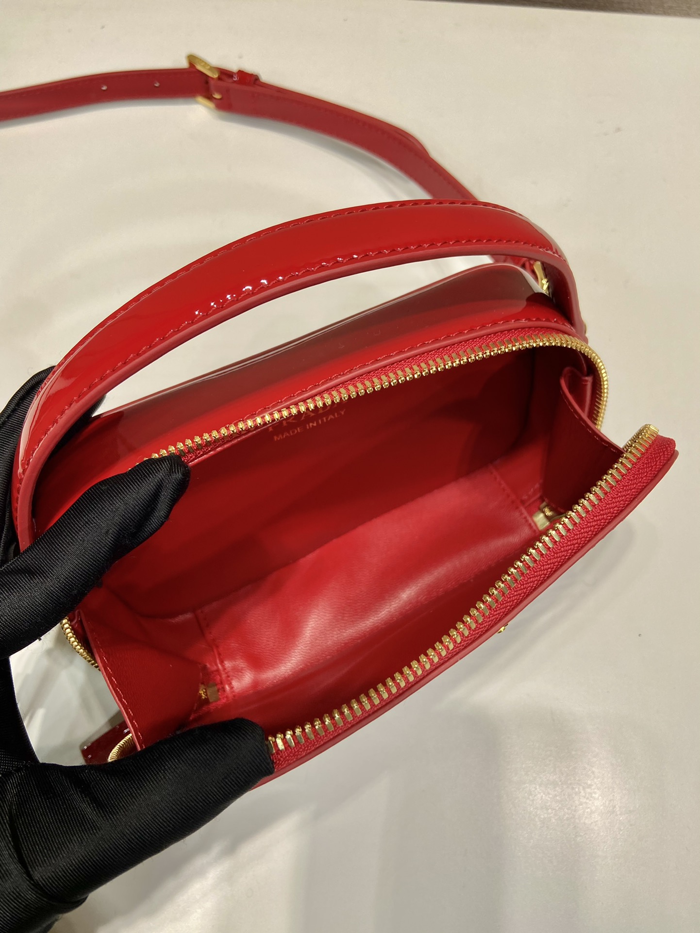 Pra*a odette patent leather mini-bag
