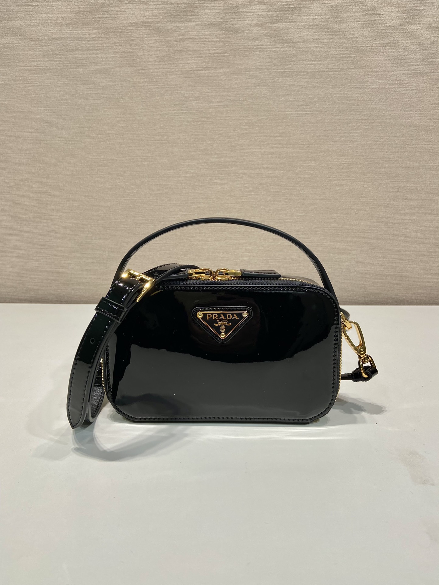 Pra*a odette patent leather mini-bag