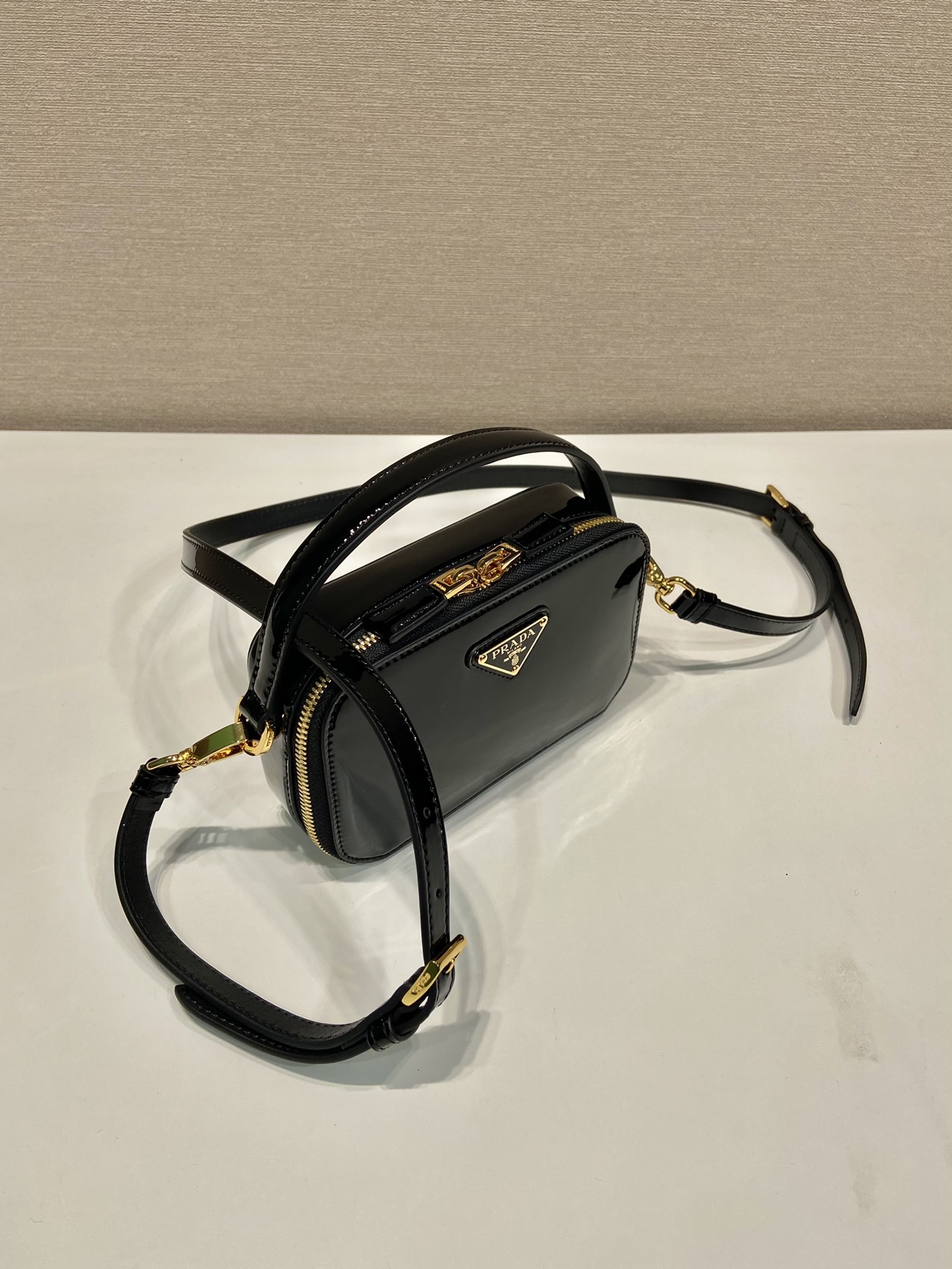 Pra*a odette patent leather mini-bag