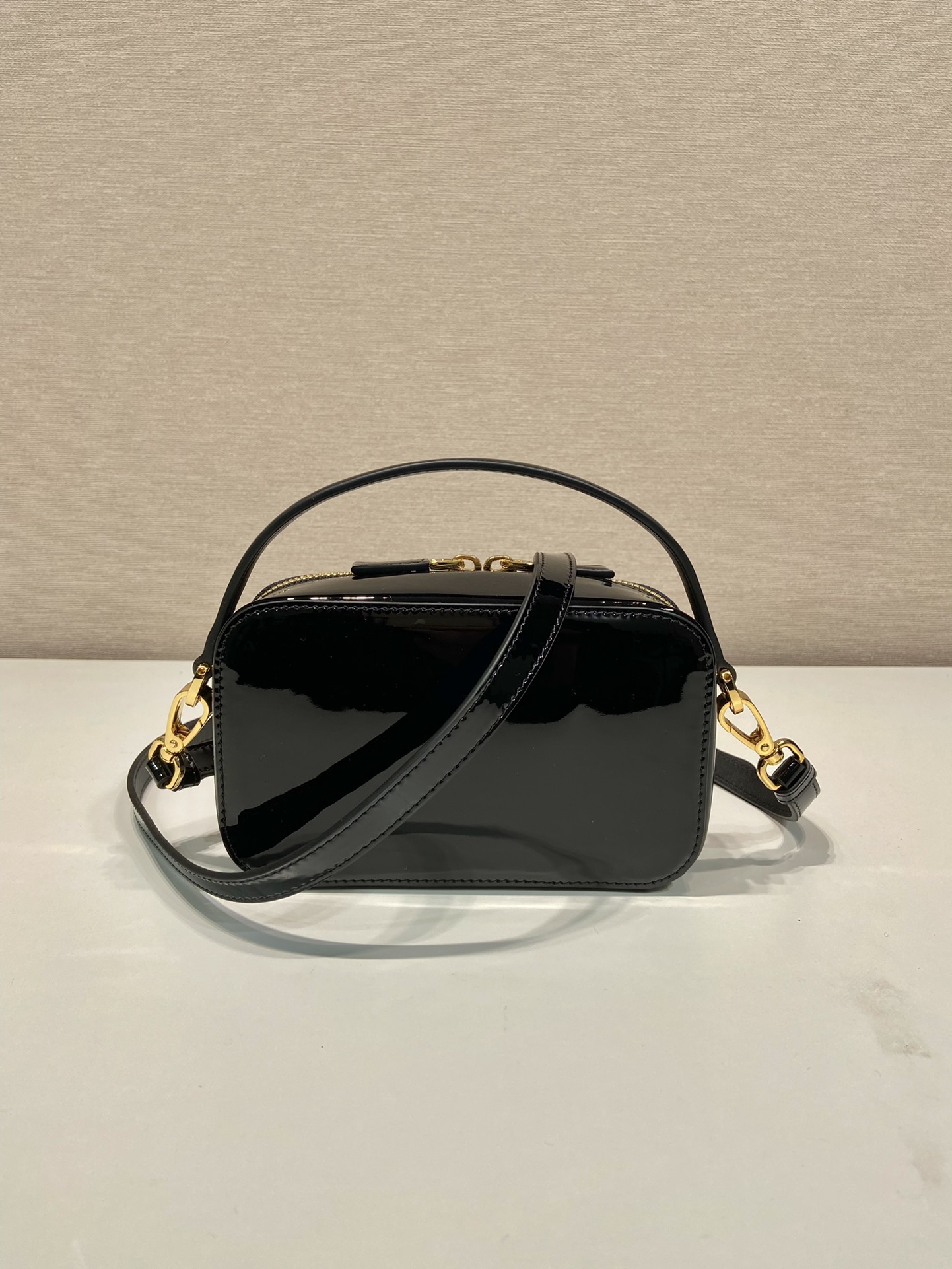 Pra*a odette patent leather mini-bag