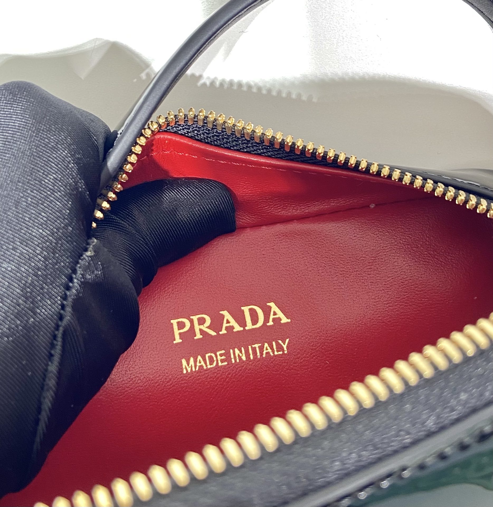 Pra*a odette patent leather mini-bag
