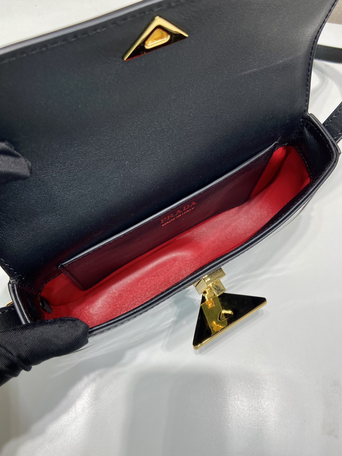 Pra*a leather shoulder bag