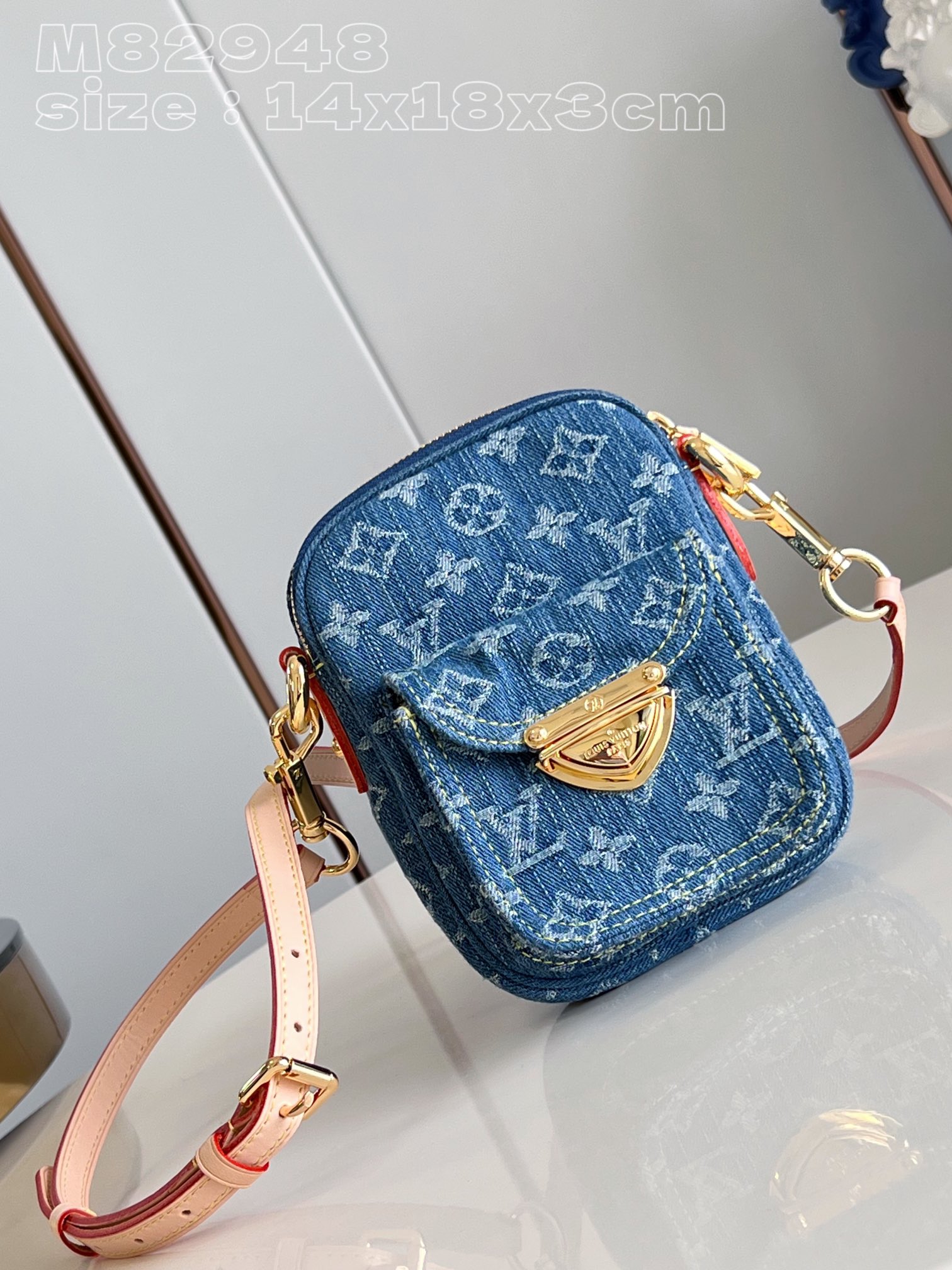 l**is V*t*n fairfax pochette monogram denim