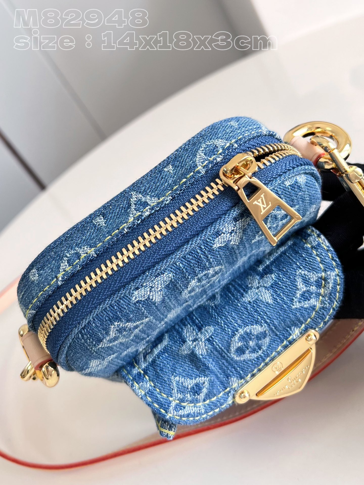 l**is V*t*n fairfax pochette monogram denim