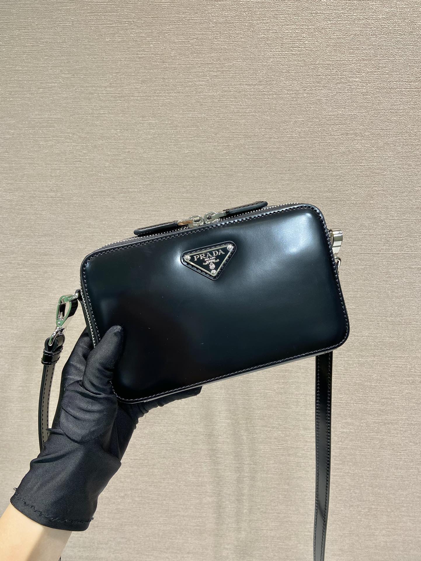 Pra*a brique saffiano leather bag