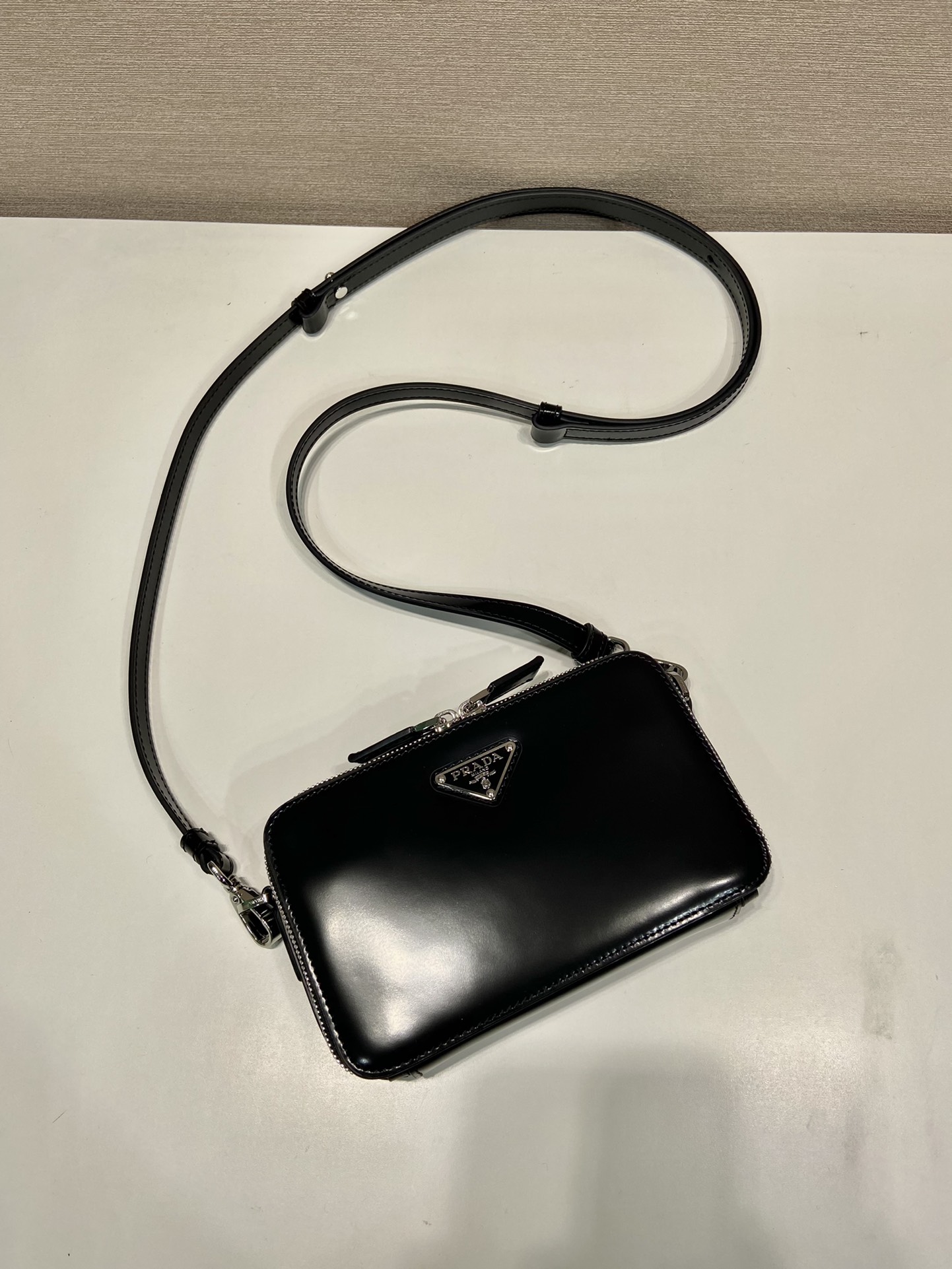 Pra*a brique saffiano leather bag