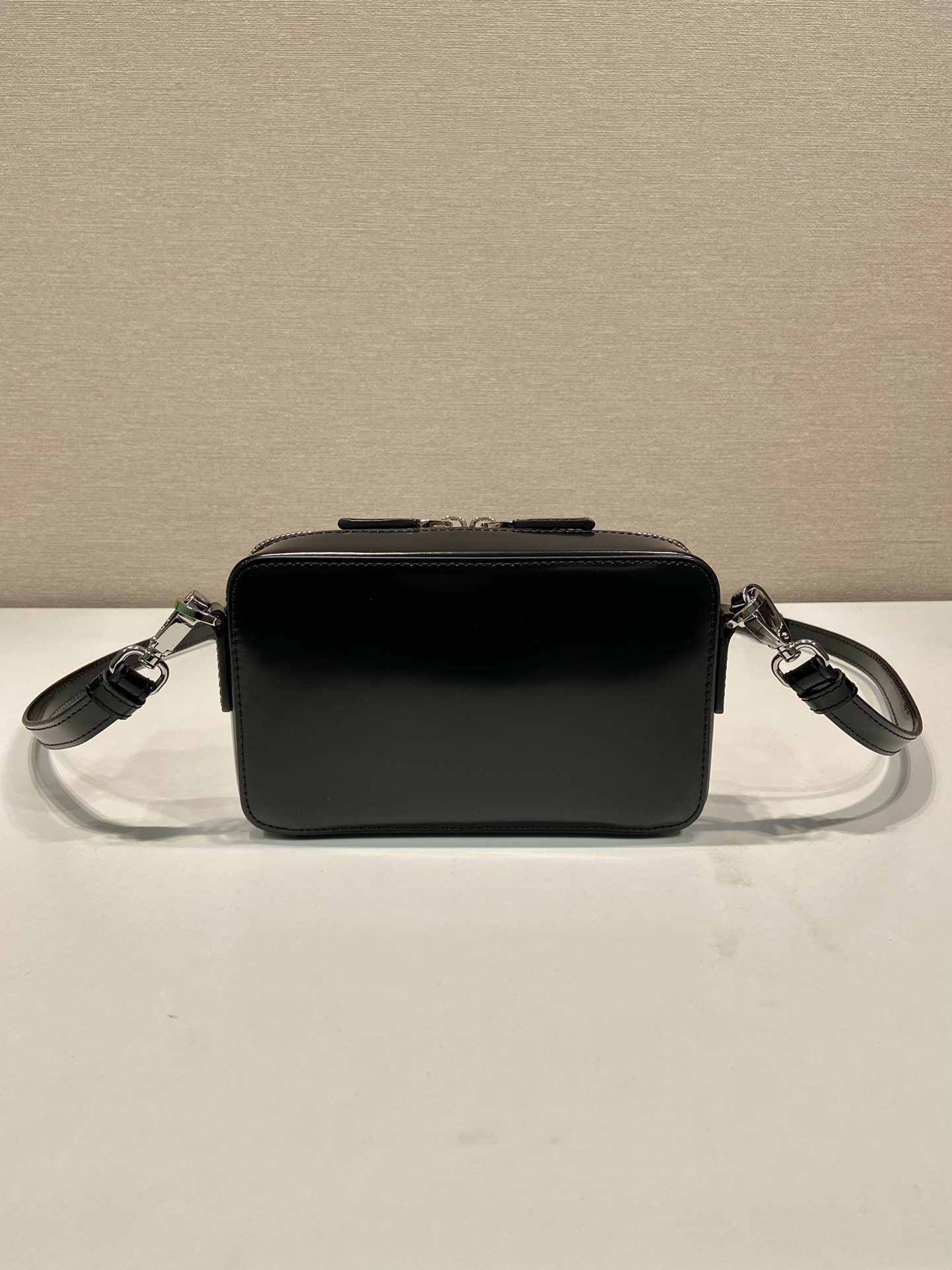 Pra*a brique saffiano leather bag