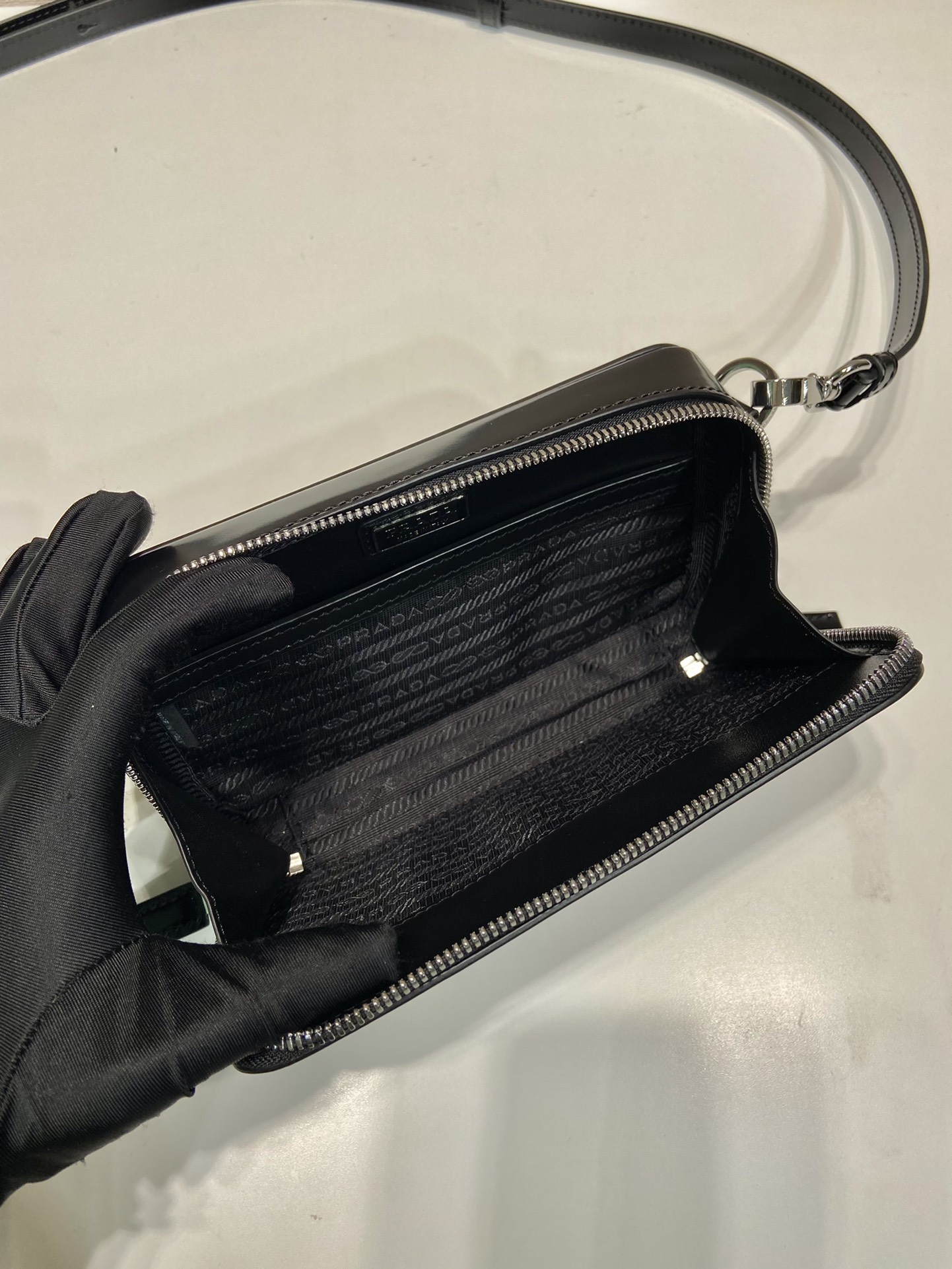Pra*a brique saffiano leather bag