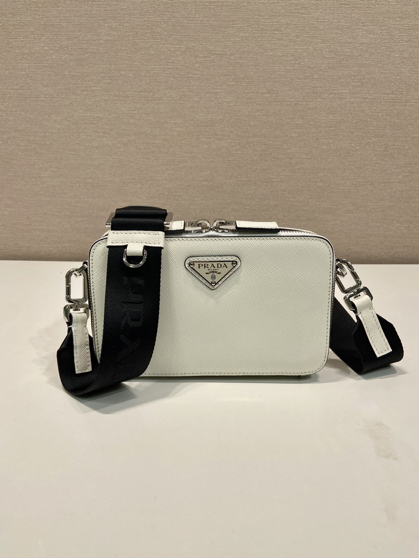 Pra*a brique saffiano leather bag