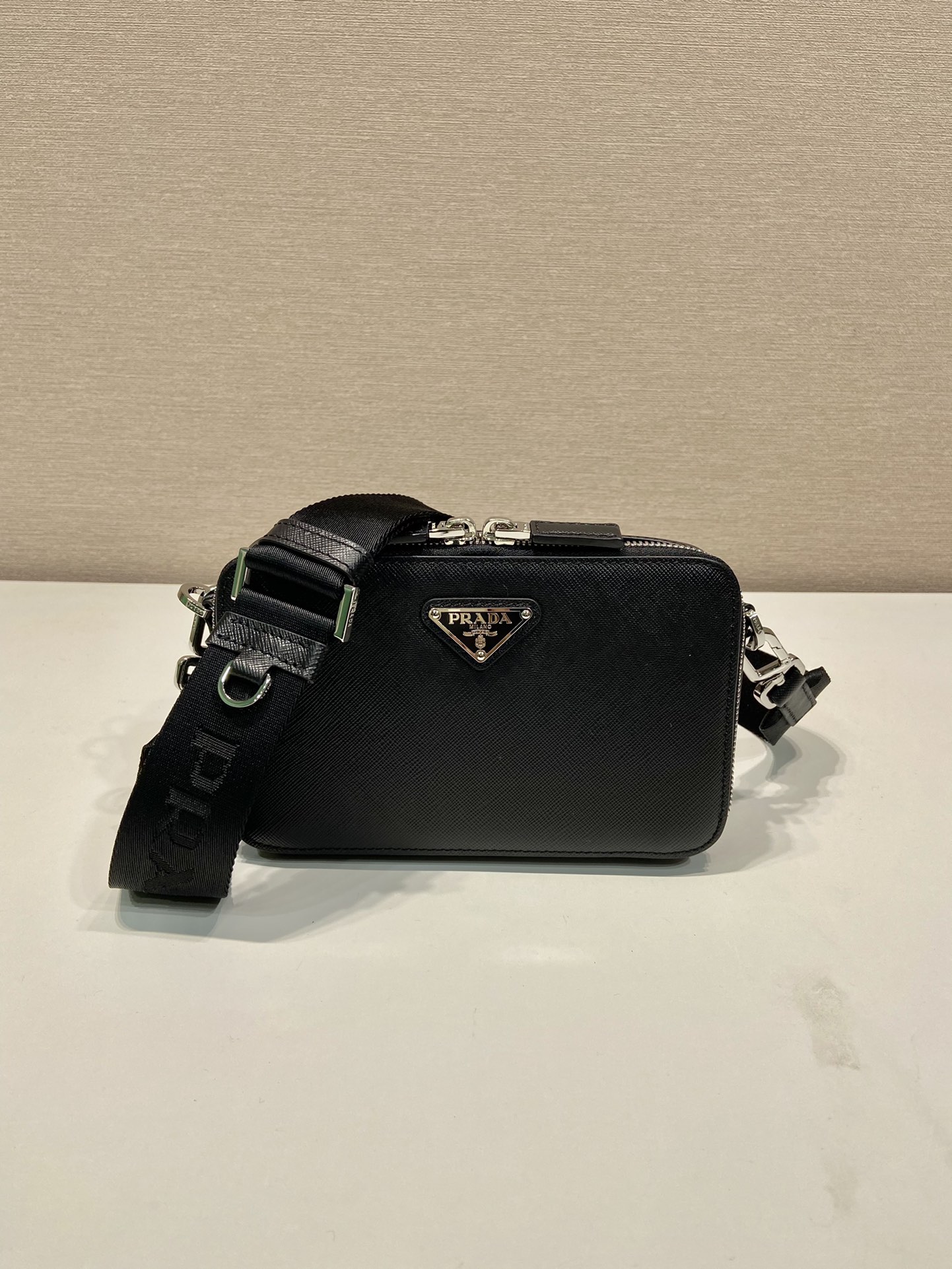 Pra*a brique saffiano leather bag