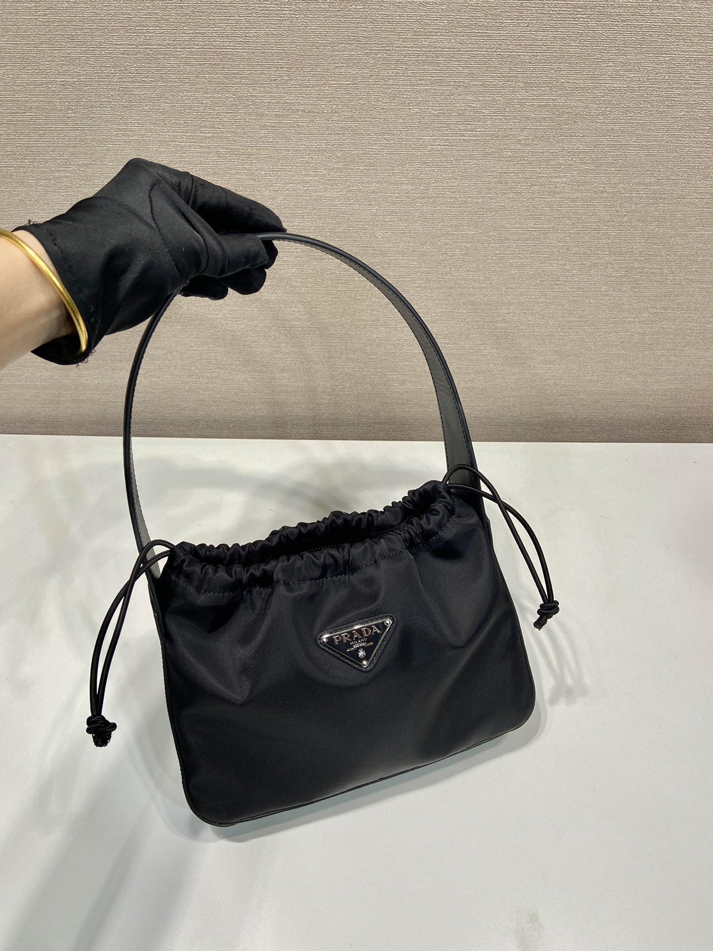 Pra*a small hobo bag