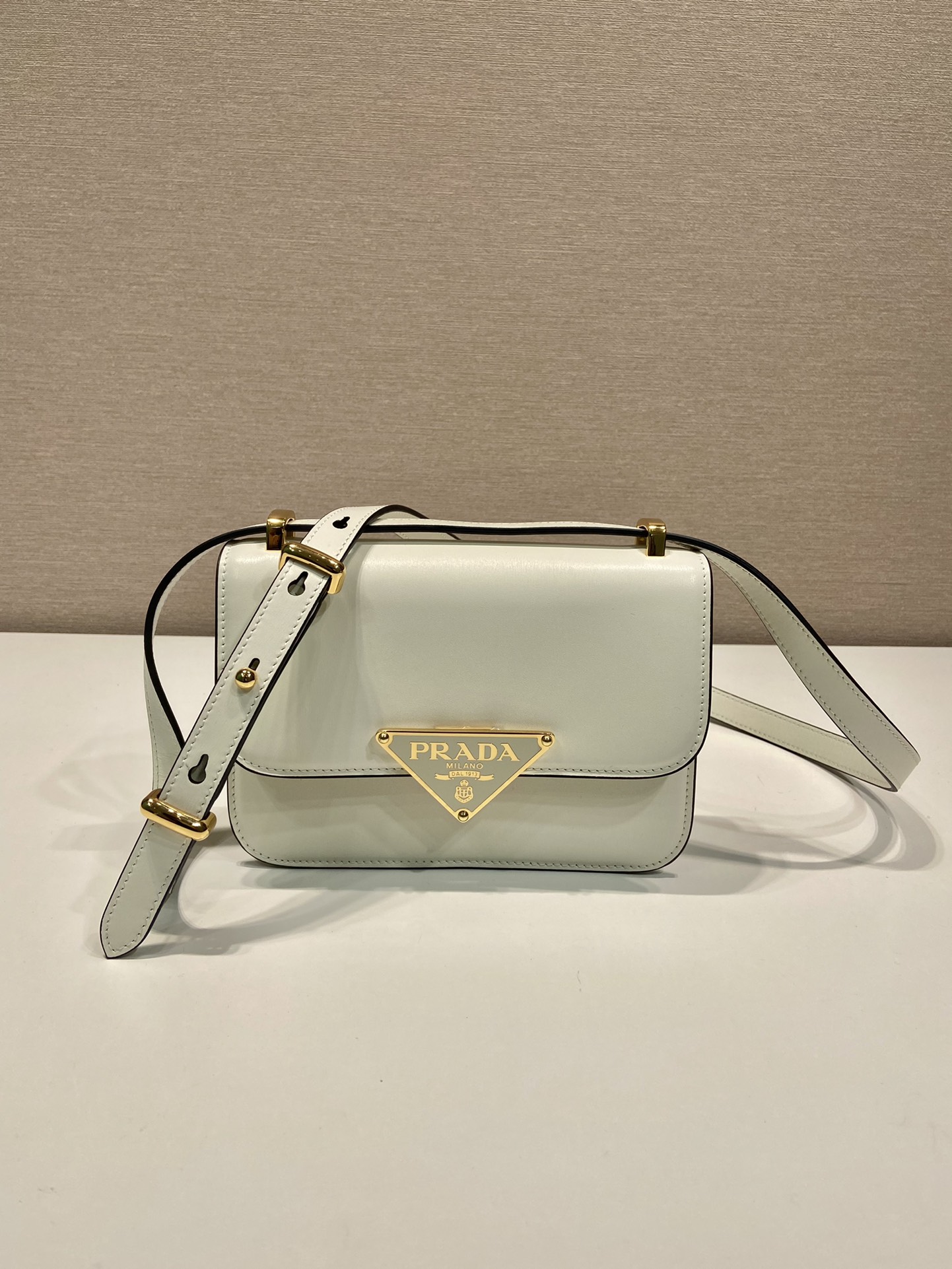 Pra*a emblème leather bag