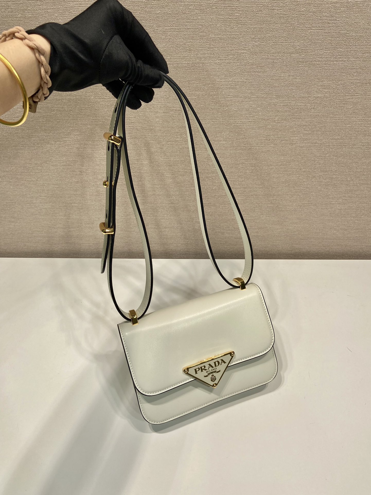 Pra*a emblème leather bag
