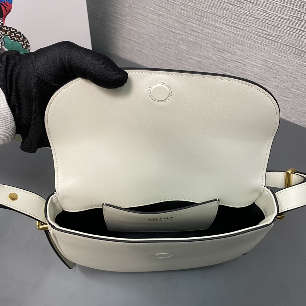 Pra*a arqué leather shoulder bag moon bag