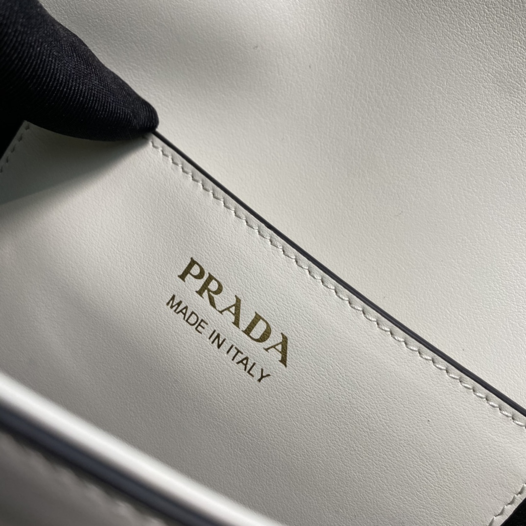 Pra*a arqué leather shoulder bag moon bag