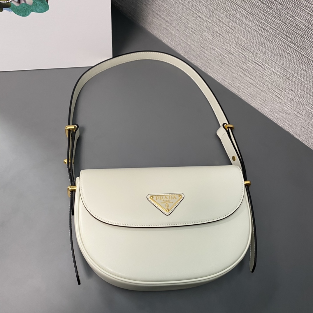 Pra*a arqué leather shoulder bag moon bag