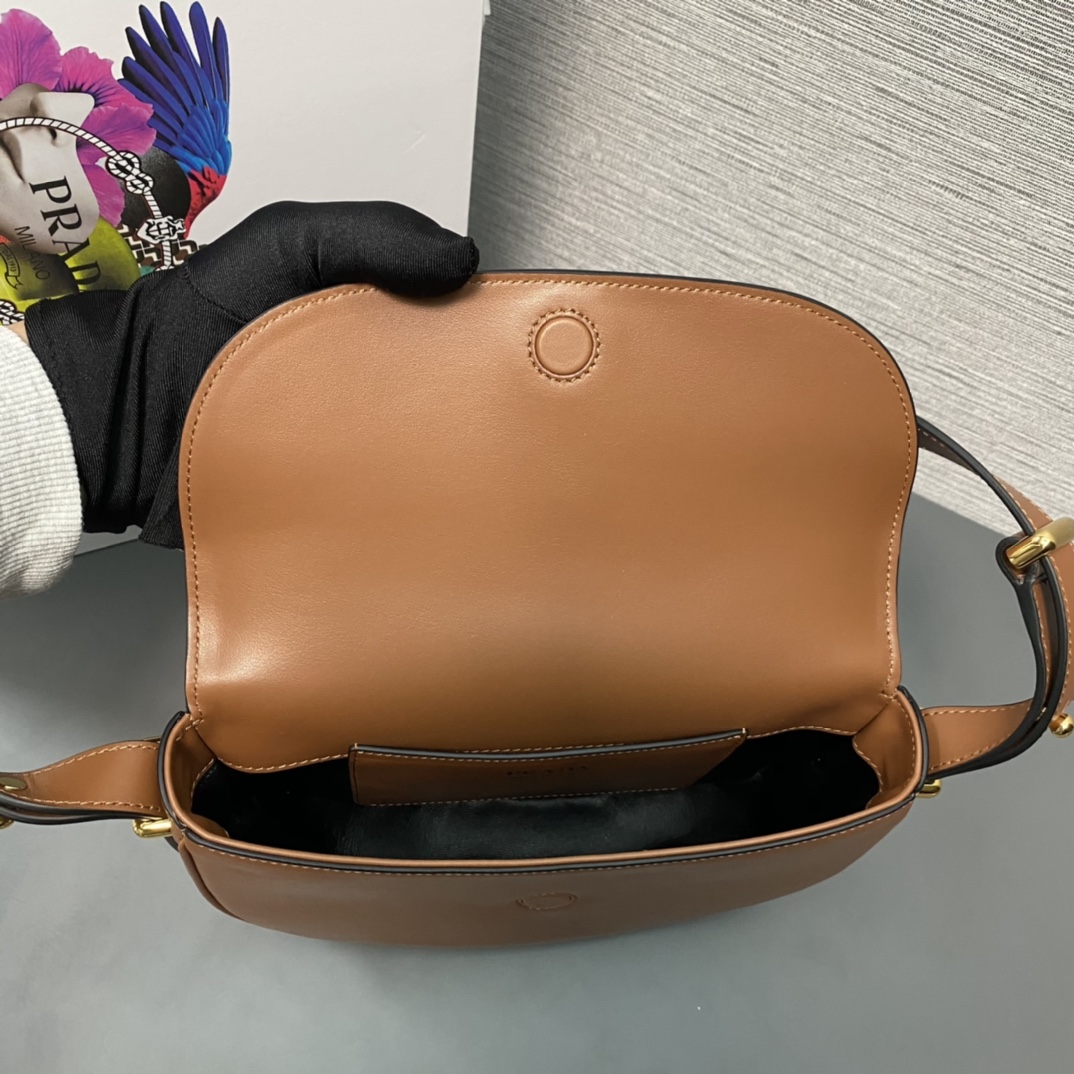 Pra*a arqué leather shoulder bag moon bag