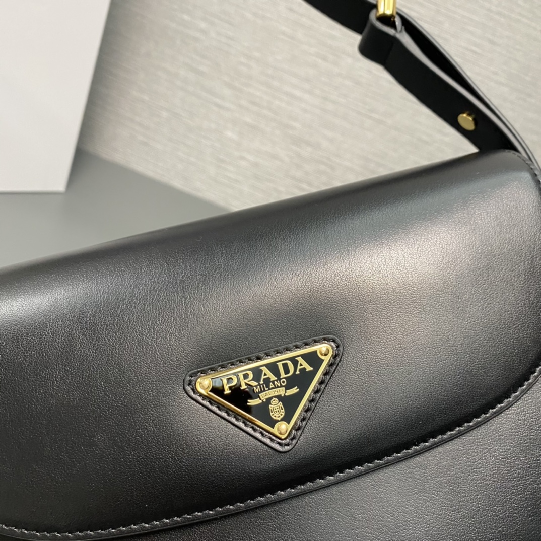 Pra*a arqué leather shoulder bag moon bag