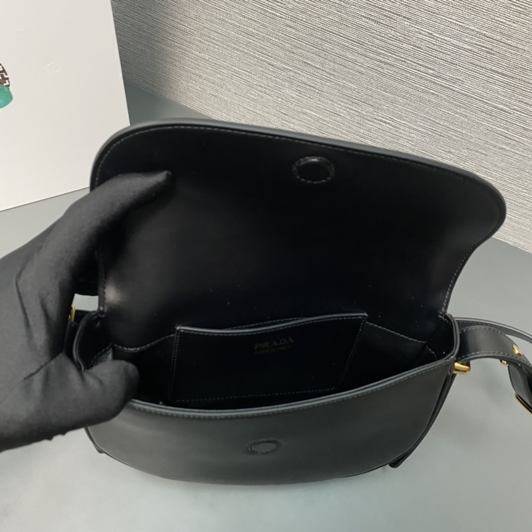 Pra*a arqué leather shoulder bag moon bag
