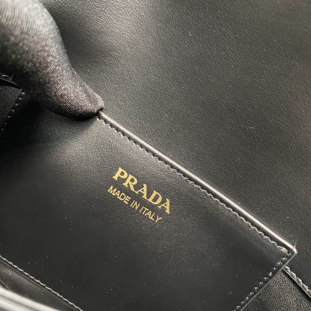 Pra*a arqué leather shoulder bag moon bag