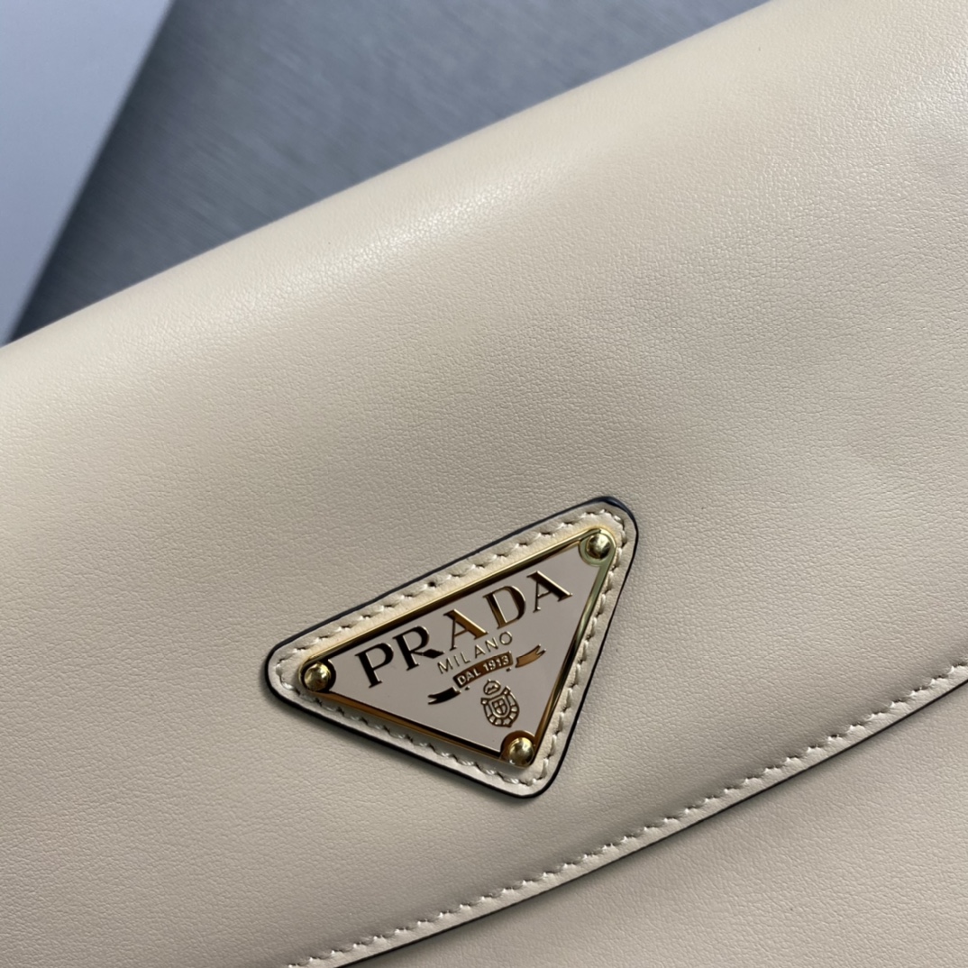 Pra*a arqué leather shoulder bag moon bag