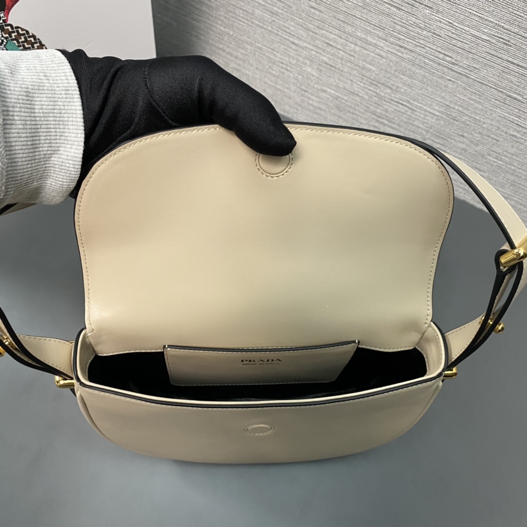 Pra*a arqué leather shoulder bag moon bag