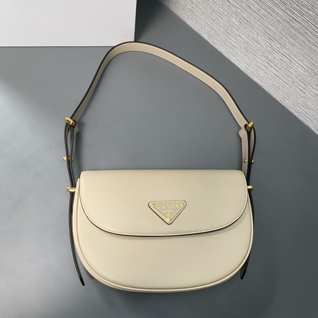 Pra*a arqué leather shoulder bag moon bag