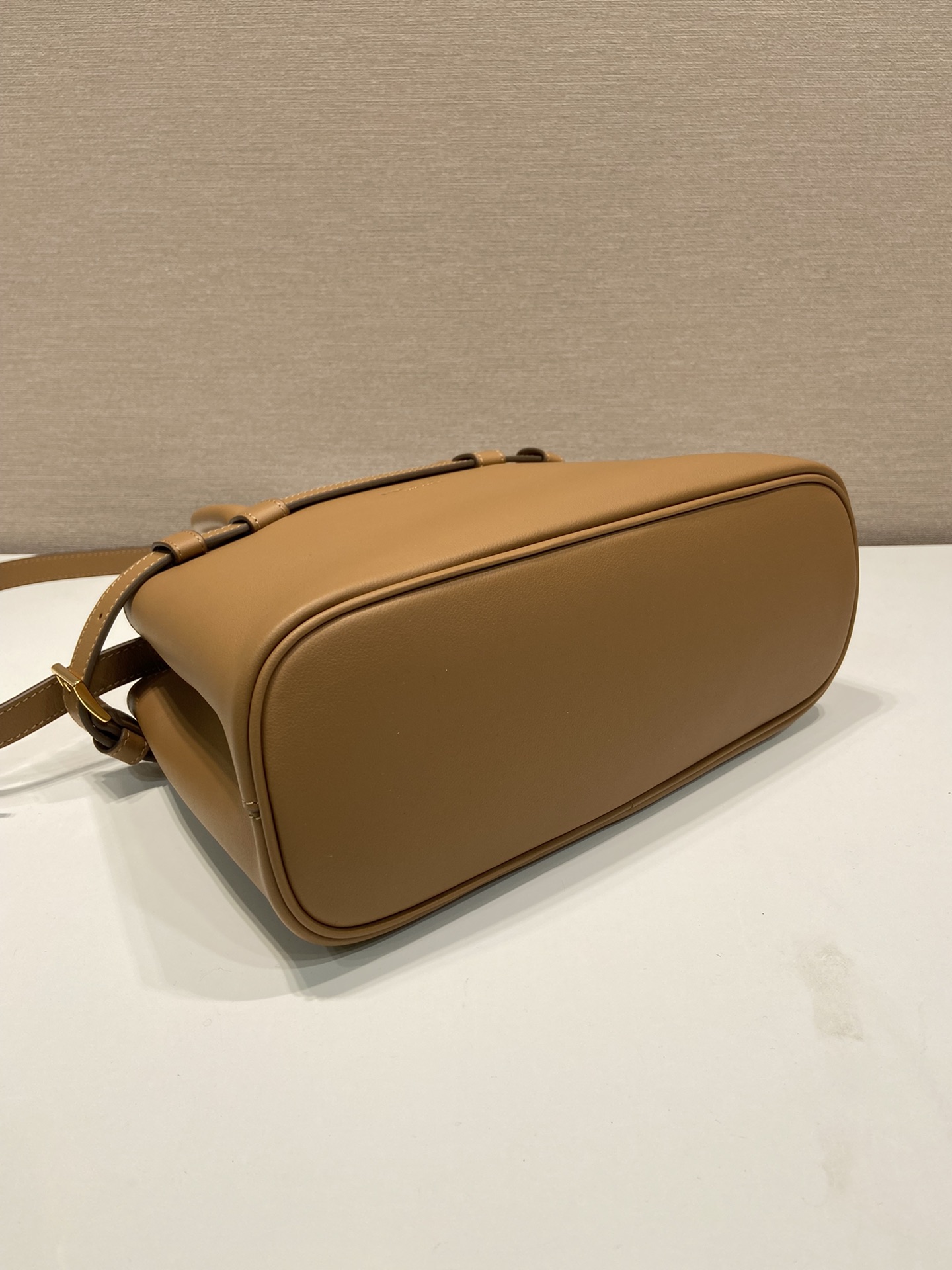 Pra*a buckle small leather handbag with double belt