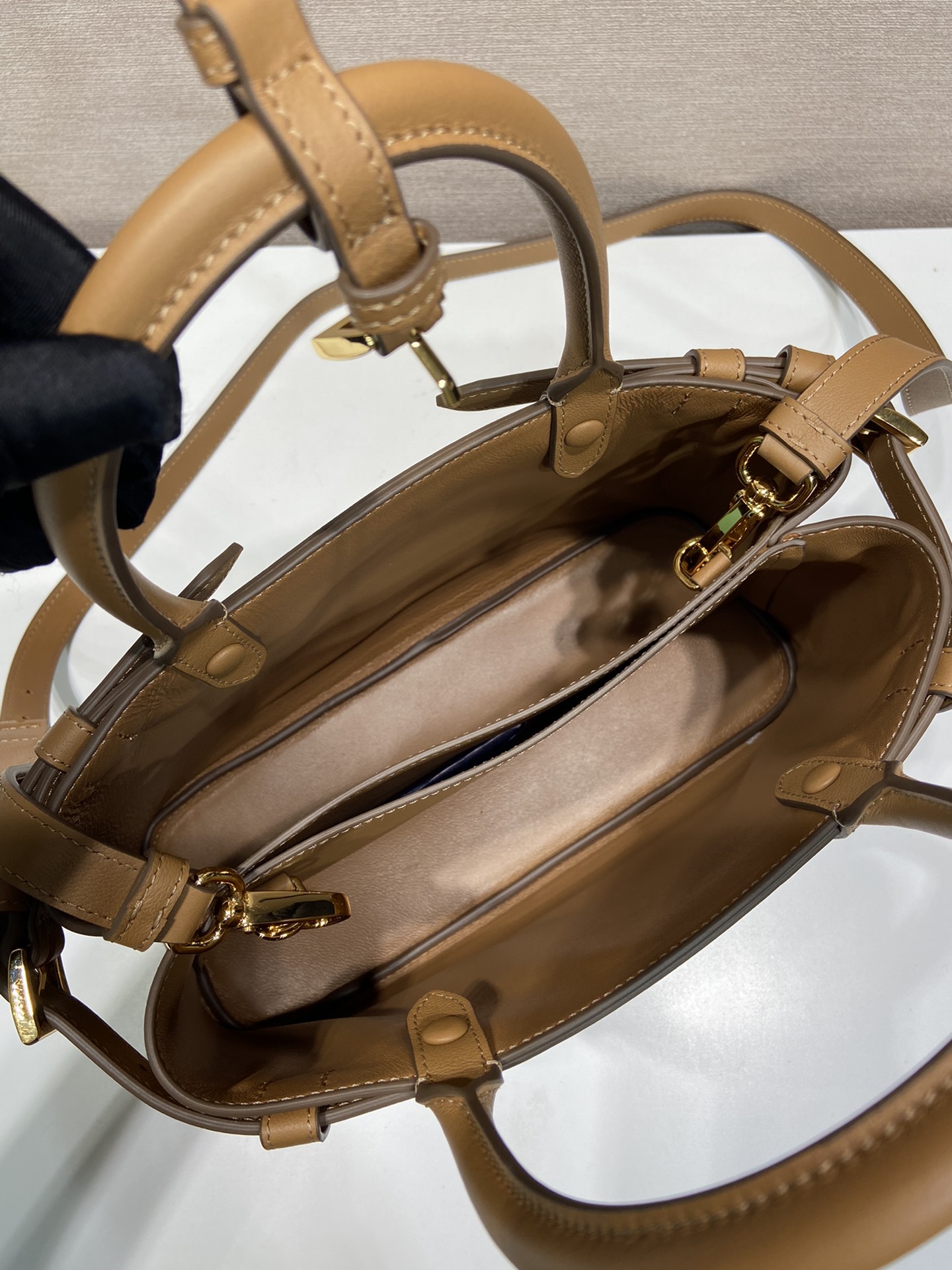 Pra*a buckle small leather handbag with double belt