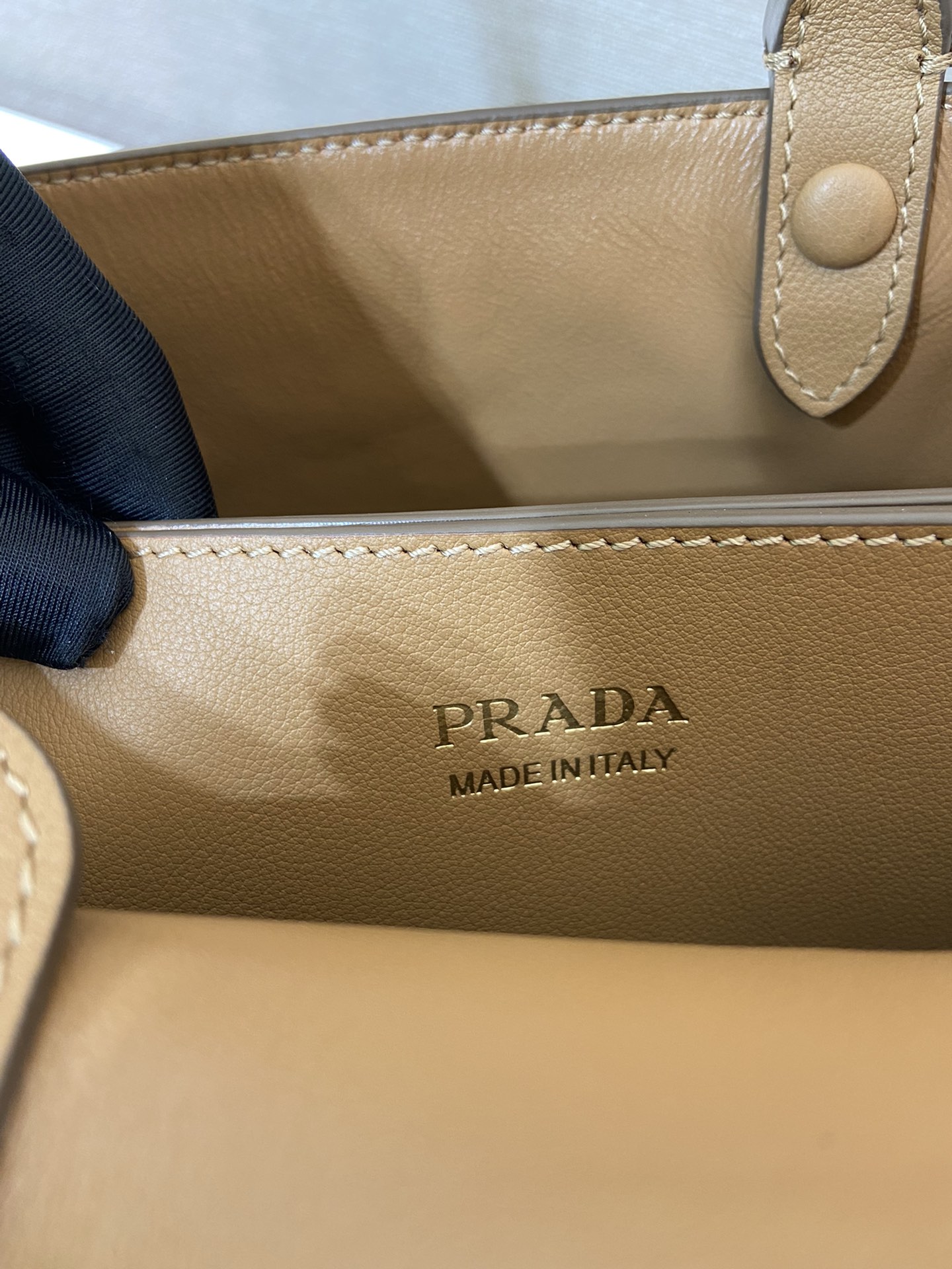 Pra*a buckle small leather handbag with double belt