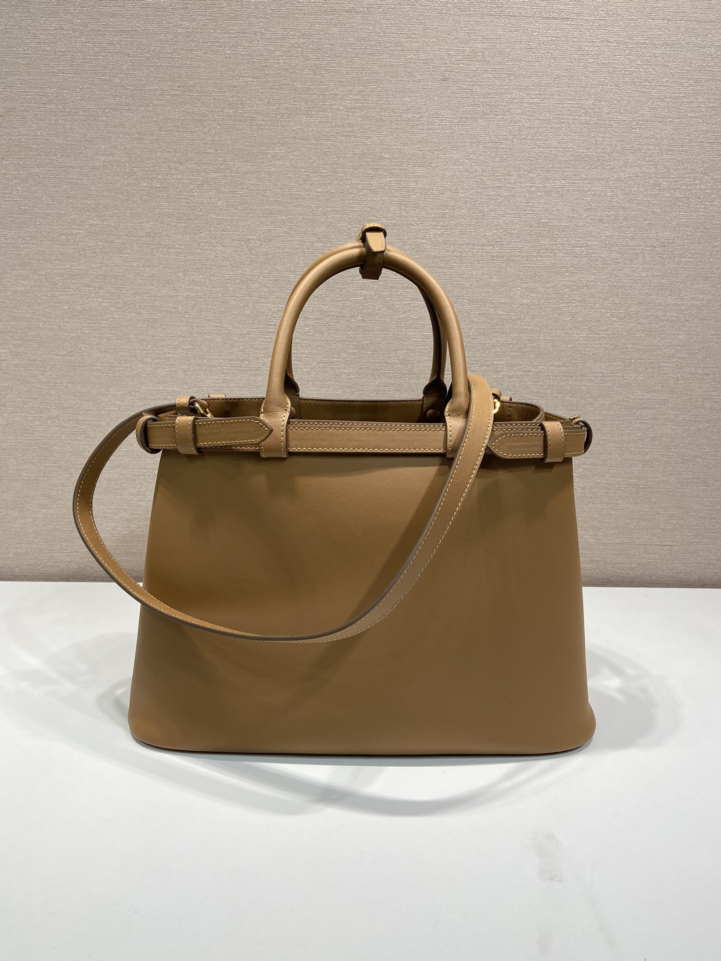 Pra*a buckle medium leather handbag with double belt