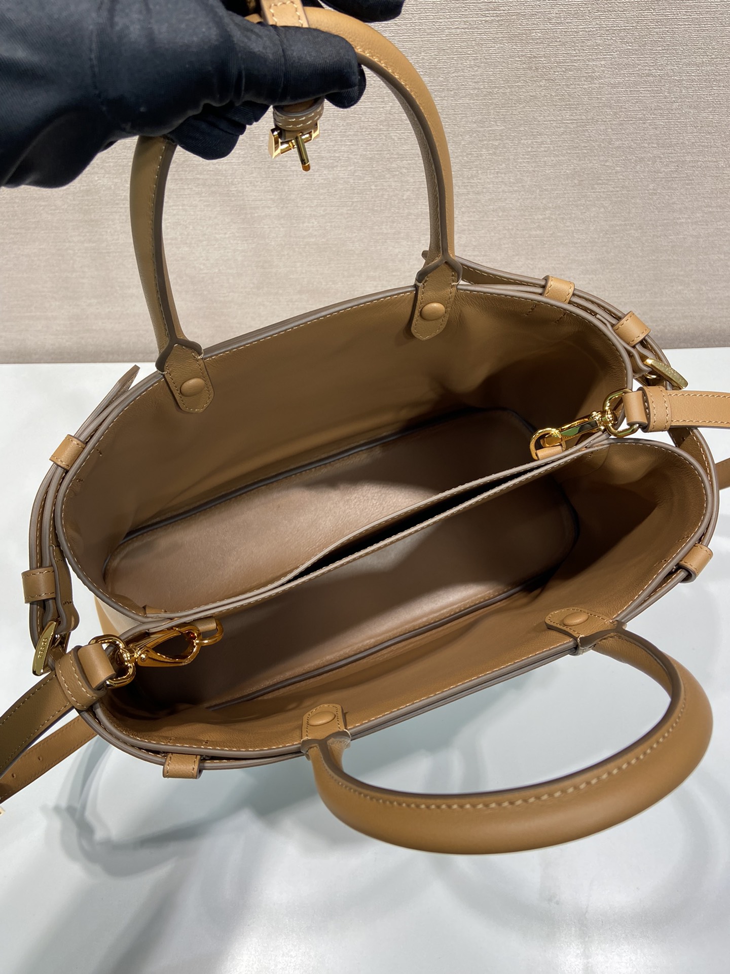 Pra*a buckle medium leather handbag with double belt