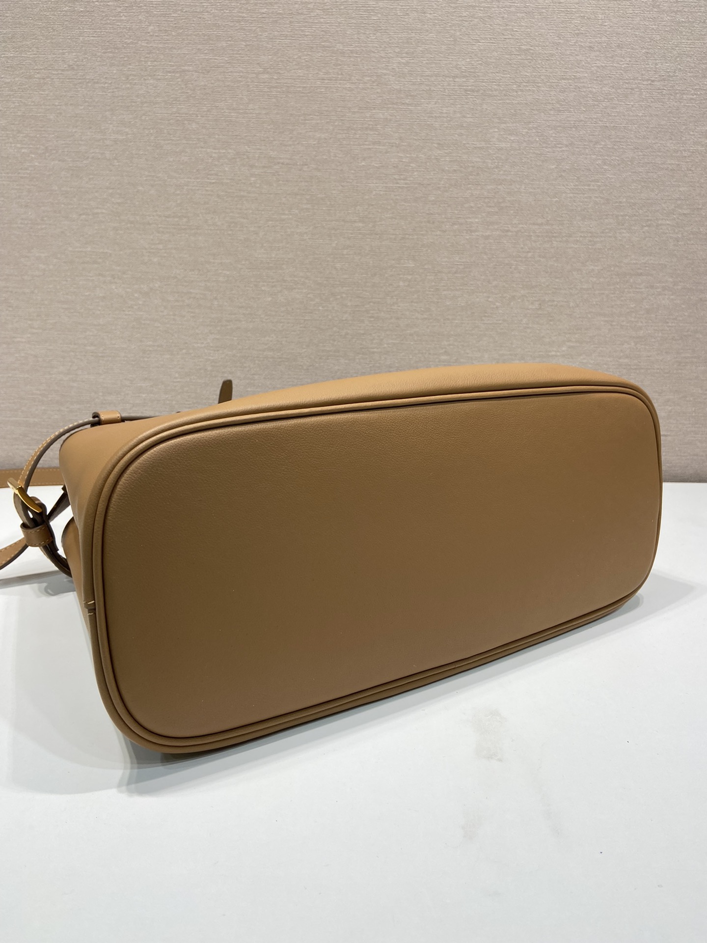 Pra*a buckle medium leather handbag with double belt
