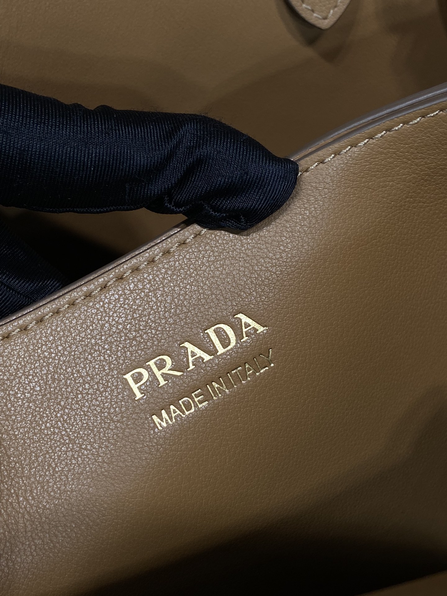 Pra*a buckle medium leather handbag with double belt