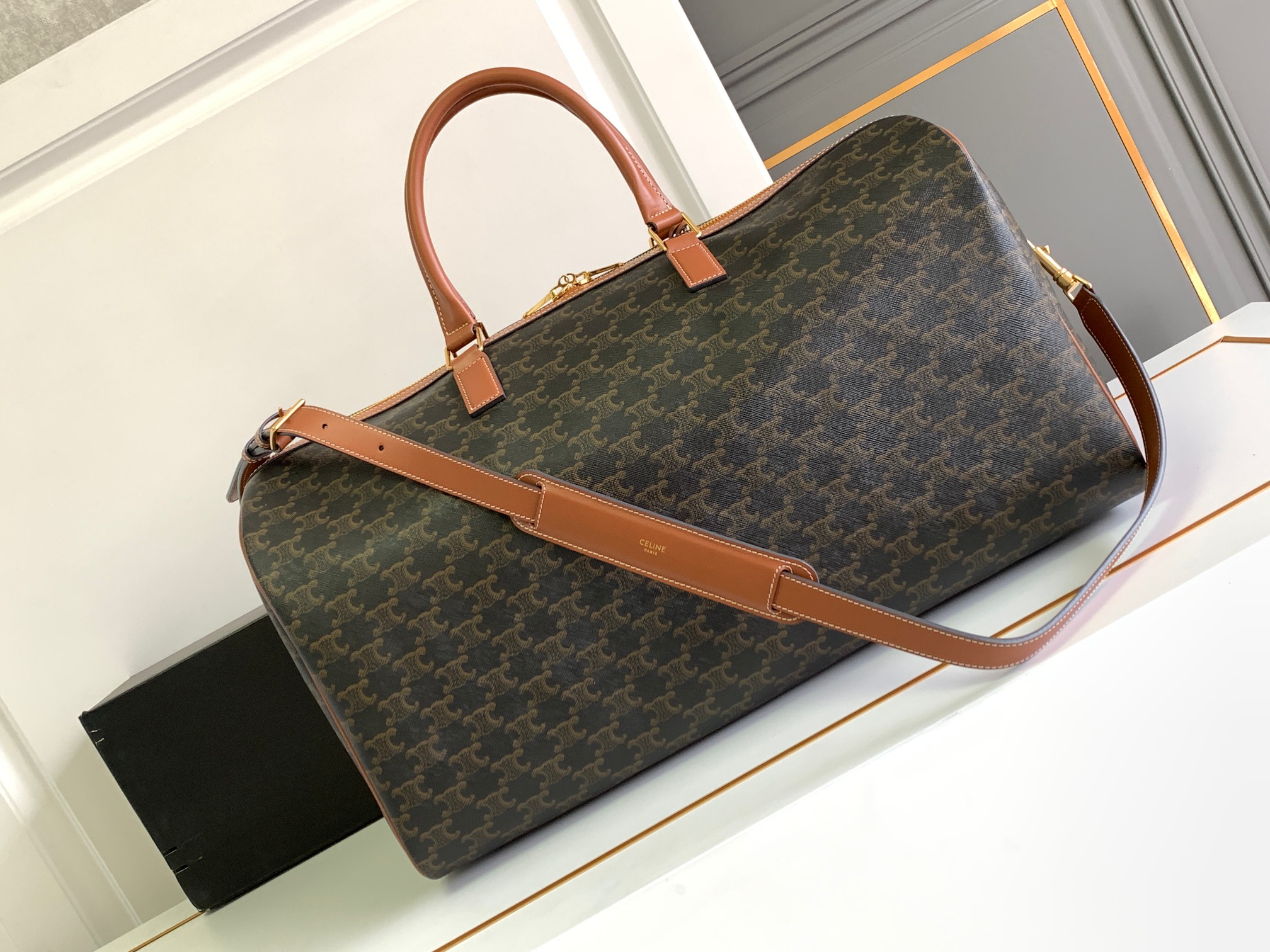 Ce**e large travel bag in triomphe canvas