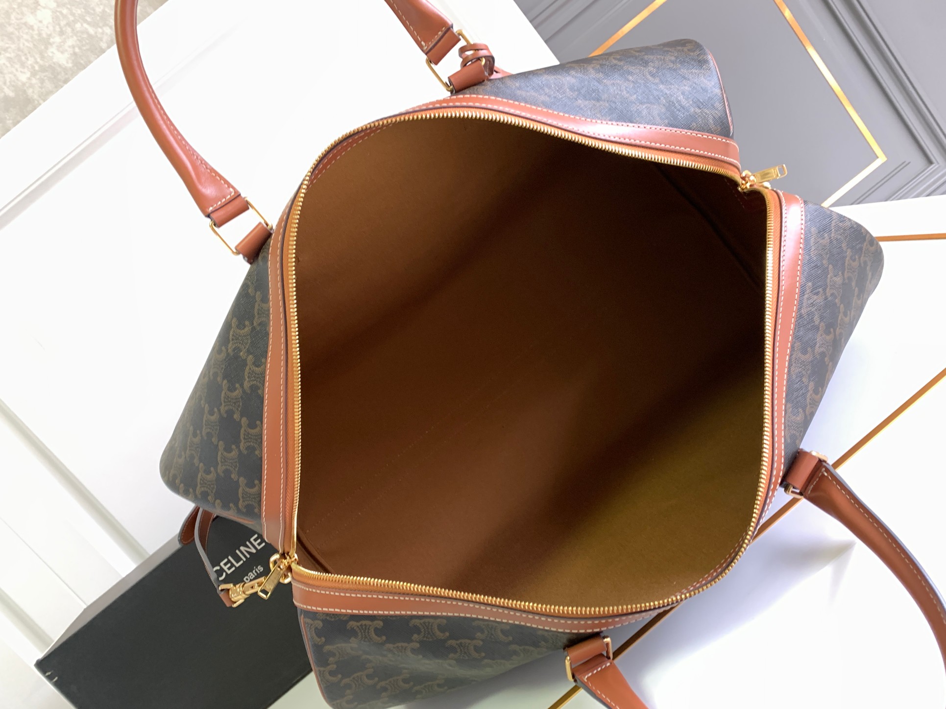 Ce**e large travel bag in triomphe canvas