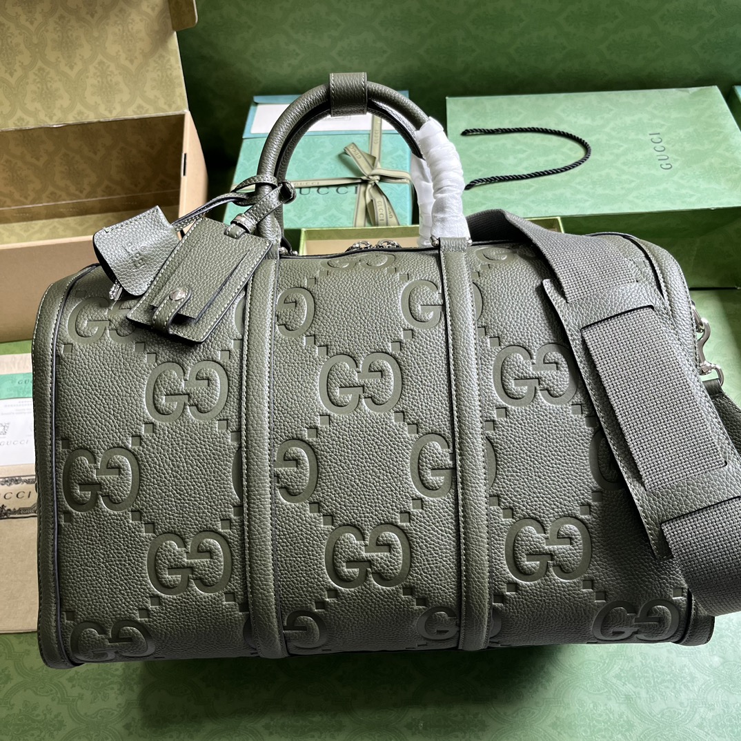 G*u*i gg duffle bag
