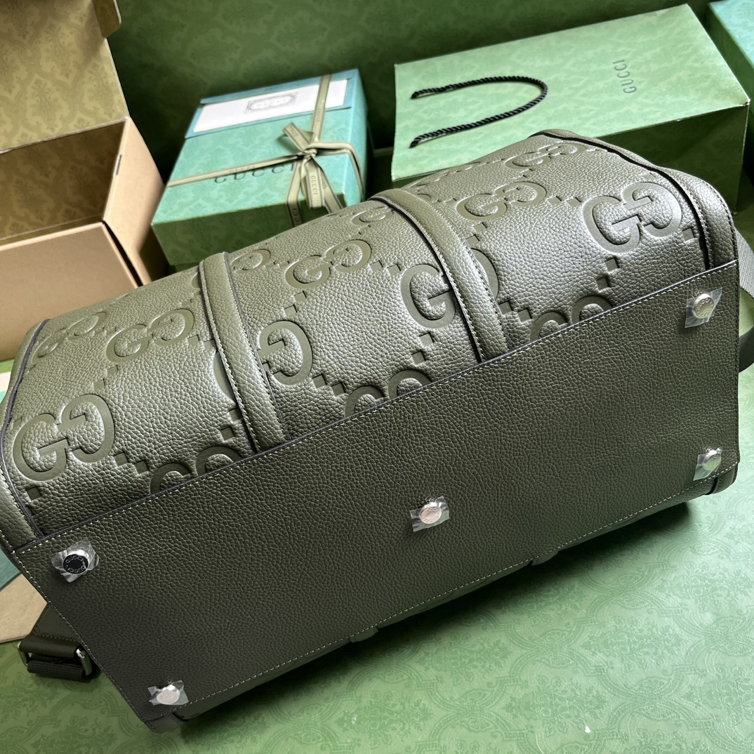 G*u*i gg duffle bag