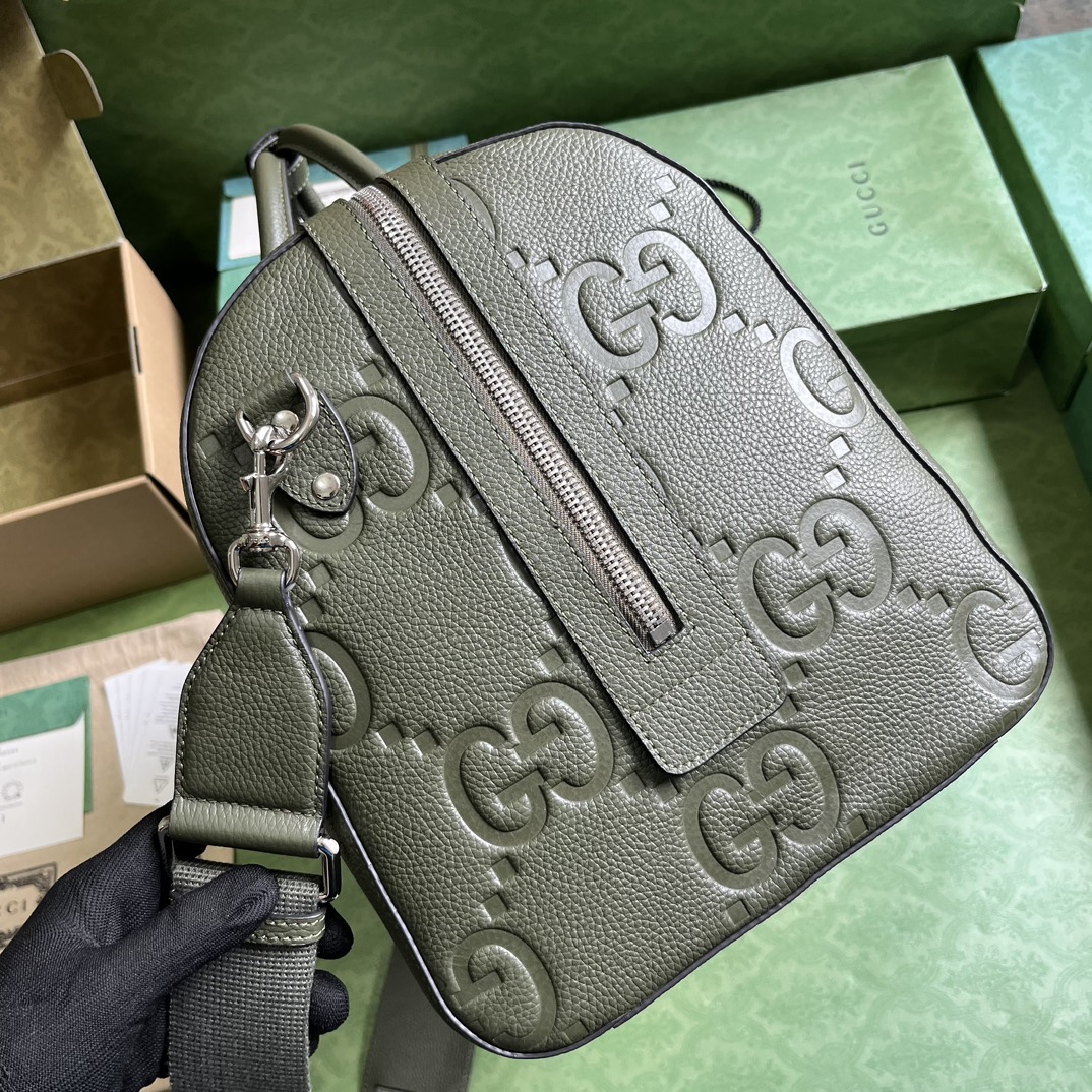 G*u*i gg duffle bag