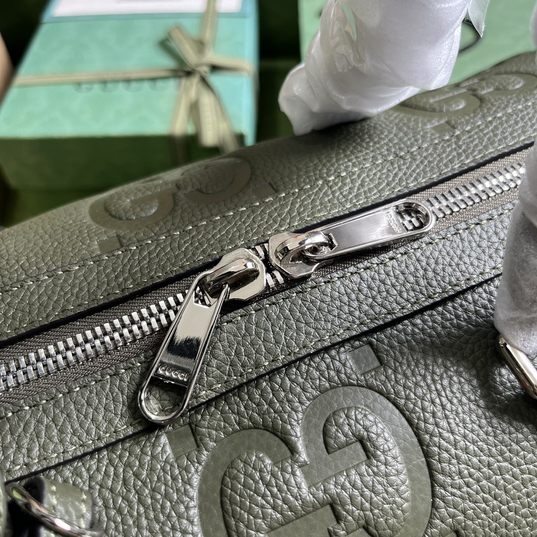 G*u*i gg duffle bag