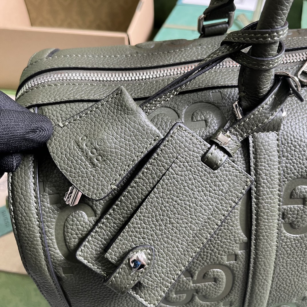 G*u*i gg duffle bag