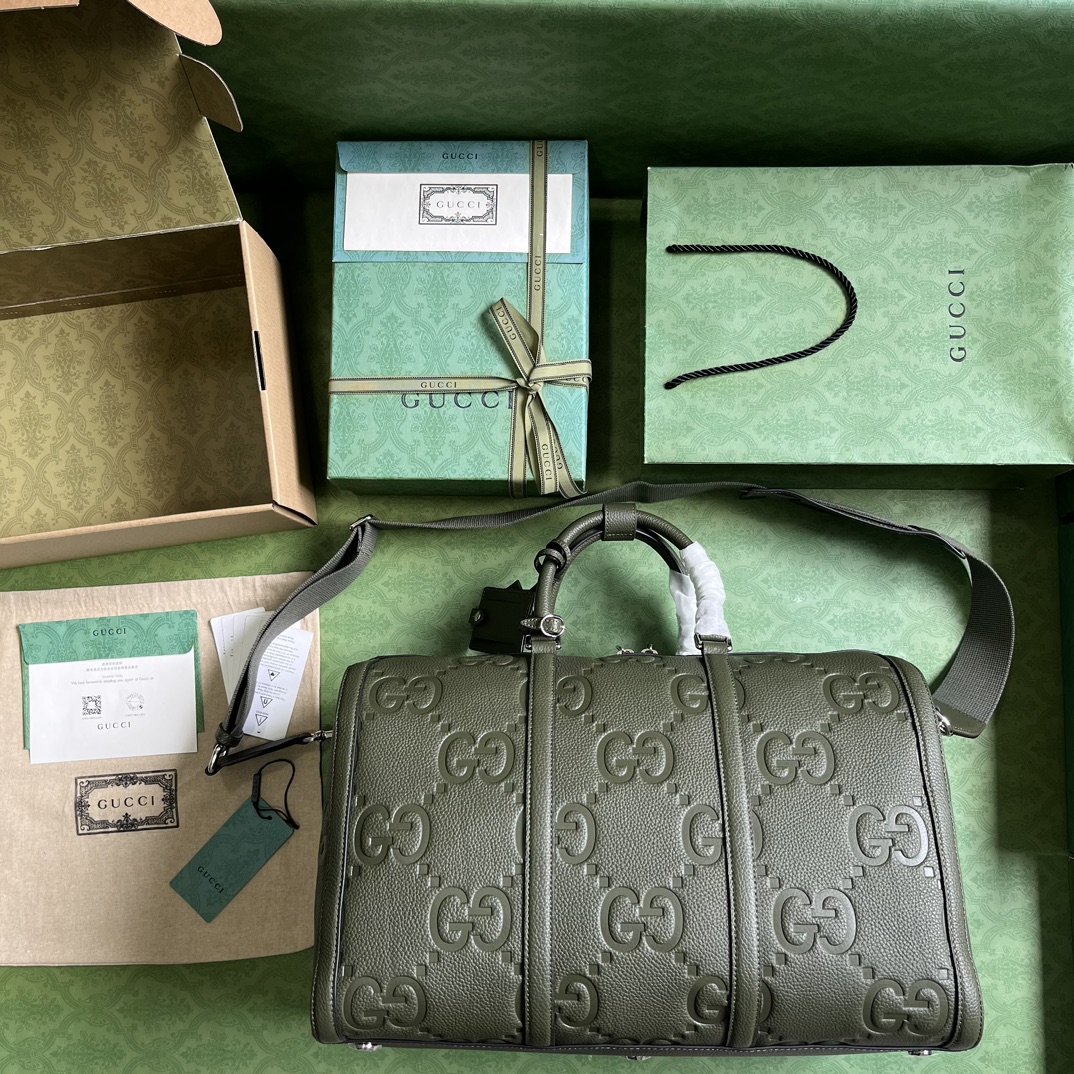 G*u*i gg duffle bag