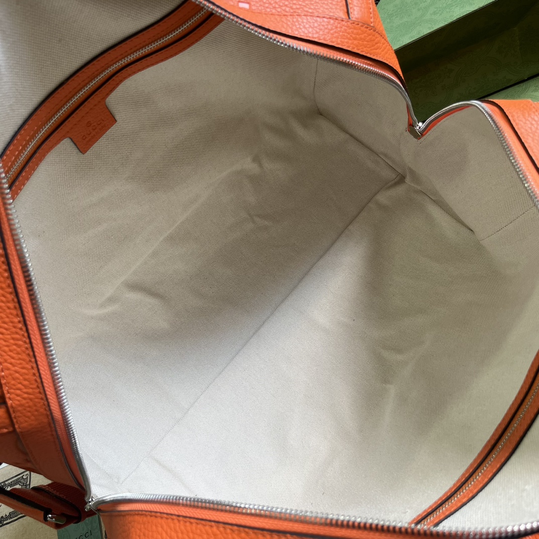 G*u*i gg duffle bag