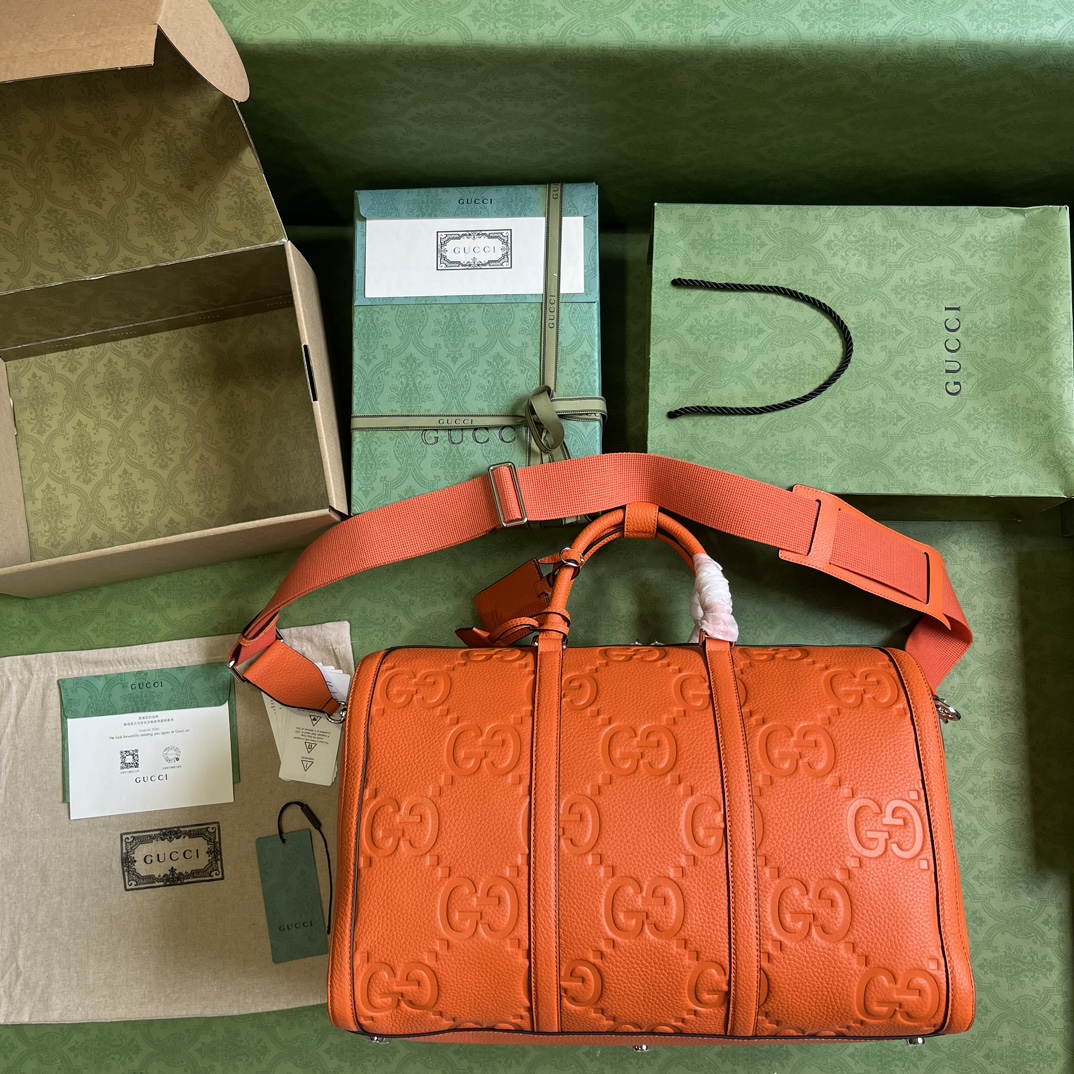 G*u*i gg duffle bag
