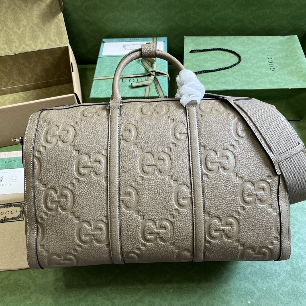 G*u*i gg duffle bag